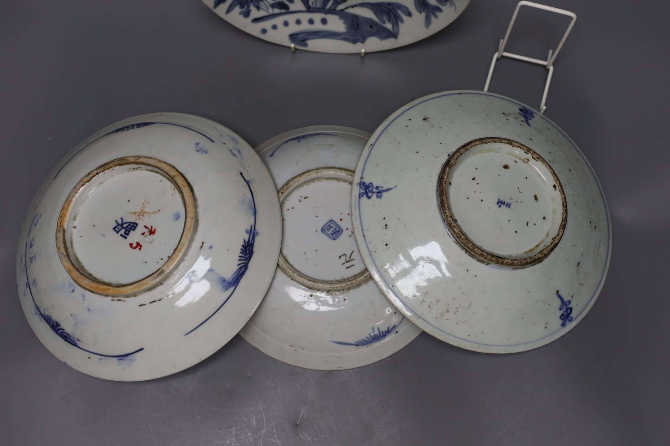 Four blue and white Chinese saucer dishes, 19th / 20thcentury, largest 25cm diameter